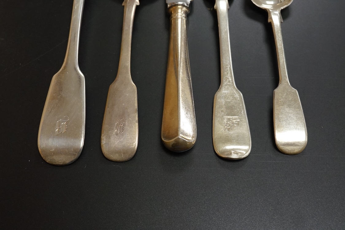 A harlequin part canteen of 19th century silver fiddle pattern flatware, comprising fifty four items, various dates and makers including twelve table spoons, twelve table forks and six dessert spoons with engraved initia